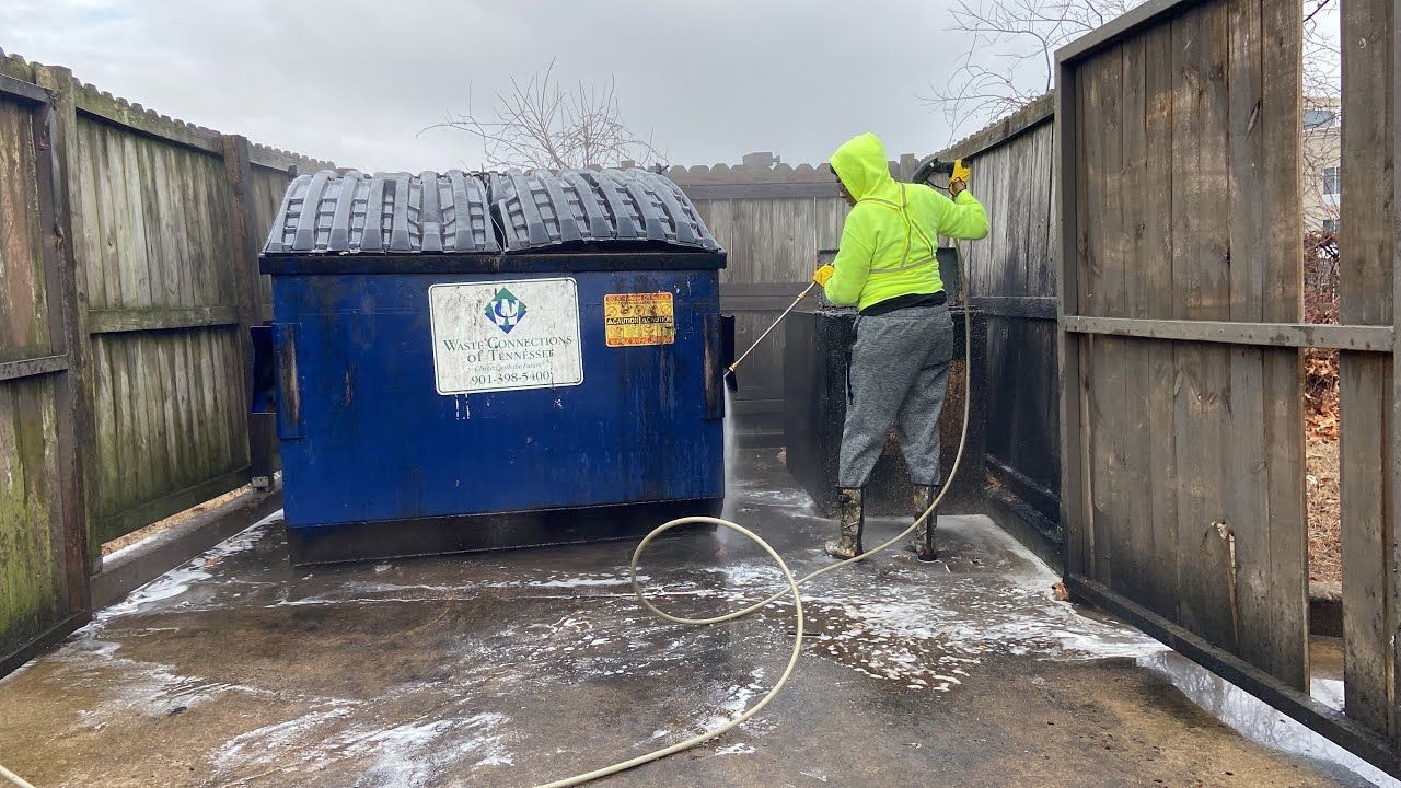 Professional dumpster pad cleaning with 200°F hot-water pressure washing — cutting through oil, bacteria, and buildup for a spotless, health-safe surface.